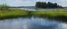 lake blue sky clouds