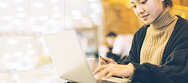 woman paying bill using laptop