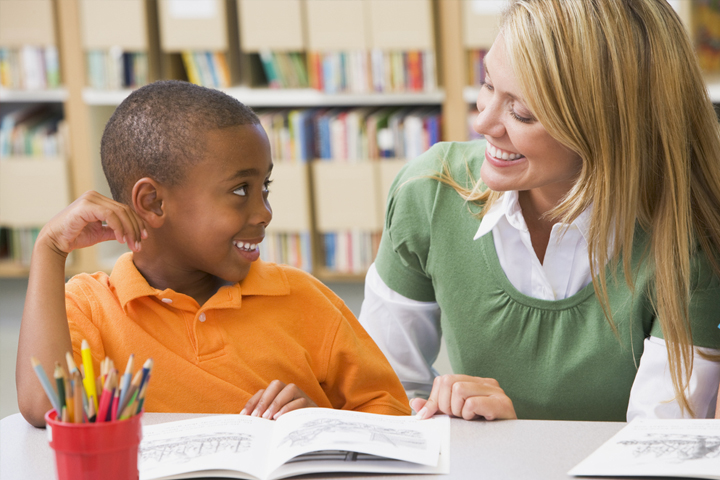 student and teacher learning with books